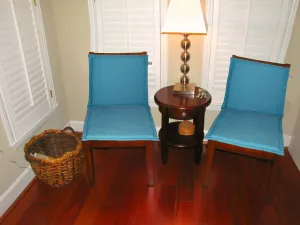 Lushomes Set of 4 Blue Reversible Chair Pads, 15x15 Inch, Waterproof Polyester, 1/2 Inch Foam